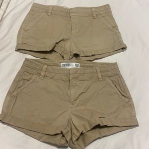 2 pairs of tan shorts